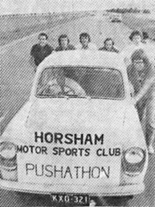 COME ON PUSH: The pushers from left, are Eric Davison, Don McMillian, Dave Donald, ??, Barry Hunt, ?? ,(behind Hunt_ and Garry Mills. ?? this week, club members were collection money from Horsham district people who sponsored the push. They ?? in ?? more than $200. PHOTO: WImmera Mail-Times
