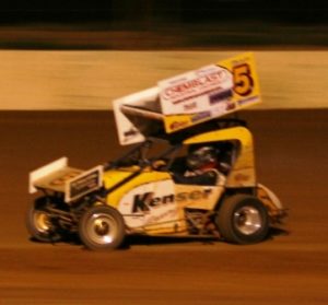 Ken Willsher races to victory in the number 5 car at Horsham