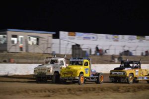 V8 TRUCKS: Wes Bell, Jaryd Carman drag down the home straight with Luke James is hot pursuit PHOTO: Mark Cowin