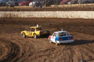 FOLLOW THE LEADER: Three Litre / Modified Production driver, Steve Ellis shows rookie Street Stock driver, Jamie Collins how it's done. PHOTO: Paul Flach