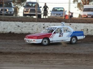 HIGH LINE SKYLINE: Jamie Collins learning the craft of turning counter steering with the ASCF Open Sedans. PHOTO: Leanne Shanks