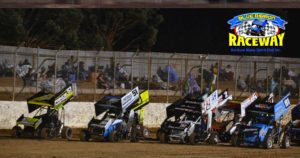 FOUR WIDE: Formula 500 drivers perform a four-wide salute to the speedway fans that came out to watch in the cold conditions. PHOTO: Mark Cowin