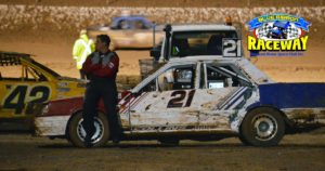 SIDELINED SKYLINE: Jamie Collins continues to watch the race after a flat tyre ended his race. PHOTO: Mark Cowin