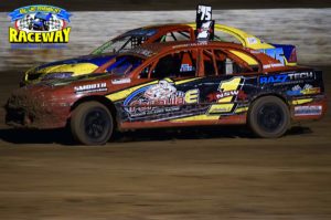 PRESSURE: Street Stock Drivers Brad McClure and Kathryn Wilken battle it out in the turn. PHOTO: M & L Speedway Photography