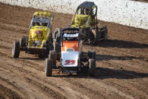 Second place Chris Ansell leads through turn four in Limited Sportsman action. PHOTO: M&L Speedway Photography