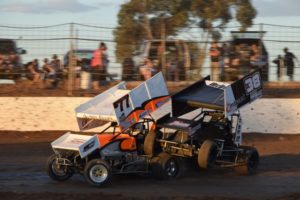 TIGHT: Action was tight during the heats of the 360 Sprintcars when the 38 car of Lachlan McDonough climbed the wheel of the #77 of Daniel Evans. PHOTO: M&L Speedway Photography.