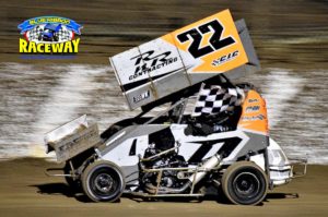 Flag: Formula 500 feature winner Dion Bellman enjoys his victory lap. PHOTO: M&L Speedway Photography