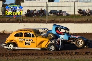 VINTAGE: Jamie Pridham gets up close and under the wheel of Dave Monaro. PHOTO: M&L Speedwawy Photography